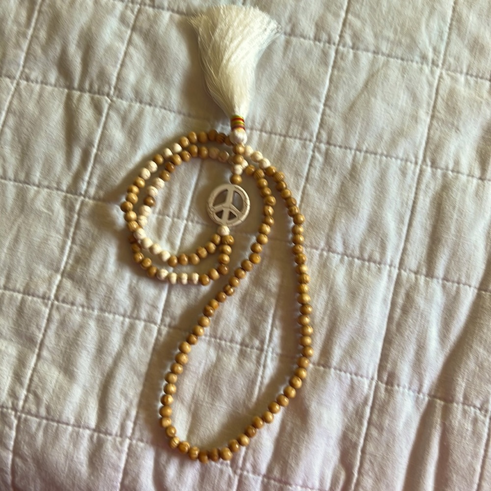 Boho 24” peace sign necklace.